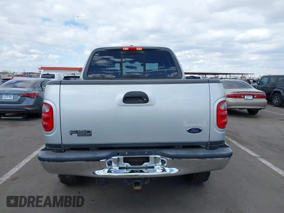 2003 Ford F-150 XLT with VIN 1FTRW08LX3KC79700, listed as a IAAI auction lot 41680562 with 131,052 mi miles. Bid and sale history available at carsss.com. Image 17.