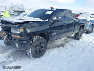 2018 Chevrolet Silverado 1500 LT with VIN 2GCVKREC6J1110953, listed as a IAAI auction lot 41352258 with 106,617 mi miles. Bid and sale history available at carsss.com. Image 2.
