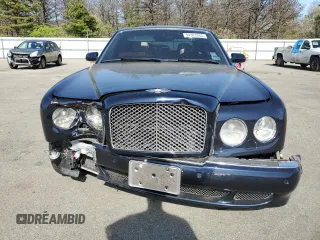 2005 Bentley Arnage R z VIN SCBLC37F15CX10517, wystawiony jako Copart lot #54303364 z przebiegiem 116 865 mil mil oraz Szkody całkowita. Historia ofert i sprzedaży dostępna na DreamBid. Obrazek 5.