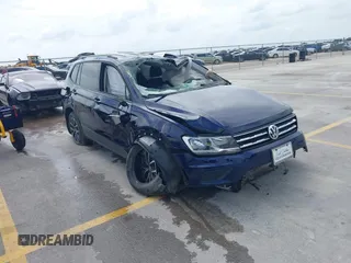 2021 Volkswagen Tiguan S with VIN 3VV1B7AX4MM150765, listed as a IAAI auction lot 42505134 with 19,590 mi miles and . Bid and sale history available at DreamBid. Image 1.