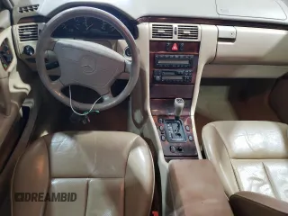 1998 Mercedes-Benz E-Class with VIN WDBJF65FXWA648112, listed as a Copart auction lot 47074665 with 0 mi miles and Salvage Title. Bid and sale history available at carsss.com. Image 8.