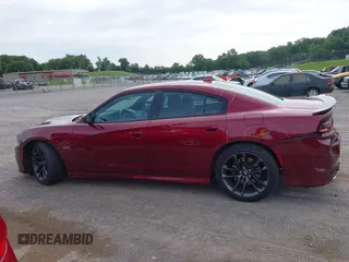 2020 Dodge Charger Scat Pack z VIN 2C3CDXGJ9LH112566, wystawiony jako IAAI lot #42330916 z przebiegiem 143 710 mil mil oraz . Historia ofert i sprzedaży dostępna na DreamBid. Obrazek 14.