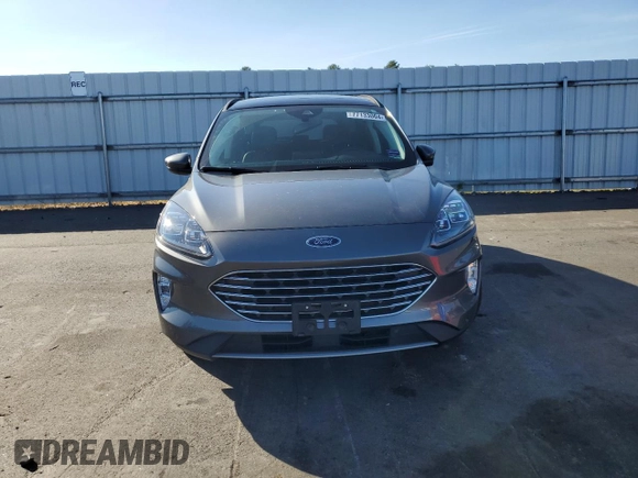 2022 Ford Escape Titanium Plug-In Hybrid with VIN 1FMCU0LZ8NUB74213, listed as a Copart auction lot 77133004 with 18,490 mi miles and Salvage title. Bid and sale history available at DreamBid. Image 5.