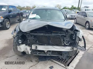 2009 Infiniti FX with VIN JNRAS18U39M101020, listed as a IAAI auction lot 41663215 with 210,583 mi miles and . Bid and sale history available at DreamBid. Image 13.