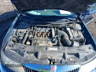 1999 Lincoln Continental with VIN 1LNHM97V8XY700644, listed as a IAAI auction lot 41641082 with 142,527 mi miles. Bid and sale history available at carsss.com. Image 10.