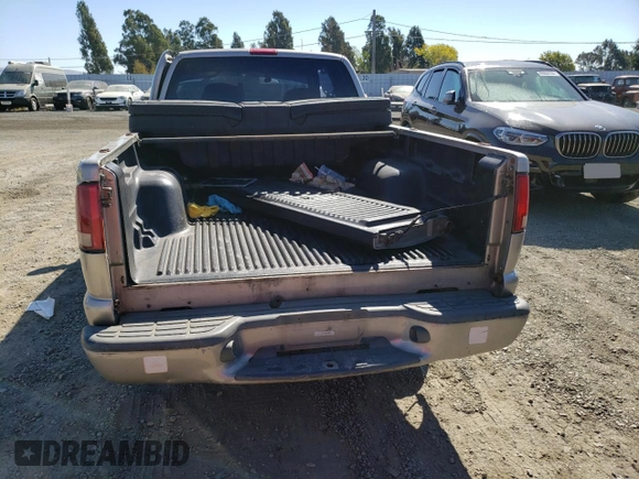 1999 GMC Sonoma SLS with VIN 1GTCS19X0X8530851, listed as a Copart auction lot 69718564 with 0 mi miles and Salvage Title. Bid and sale history available at carsss.com. Image 6.
