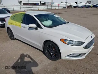 2018 Ford Fusion SE z VIN 3FA6P0HD1JR276353, wystawiony jako IAAI lot #41030735 z przebiegiem 81 164 mil mil oraz . Historia ofert i sprzedaży dostępna na DreamBid. Obrazek 1.