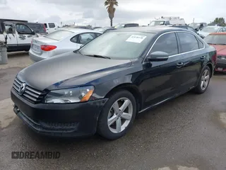 2012 Volkswagen Passat SE with VIN 1VWBP7A31CC047883, listed as a IAAI auction lot 42130138 with 142,017 mi miles. Bid and sale history available at carsss.com. Image 2.