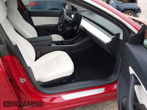 2018 Tesla Model 3 Long Range Battery with VIN 5YJ3E1EB7JF055384, listed as a IAAI auction lot 41924325 with 52,039 mi miles and . Bid and sale history available at DreamBid. Image 5.