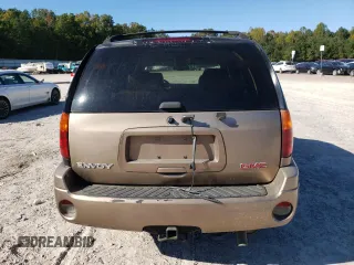 2002 GMC Envoy SLT with VIN 1GKDT13S022456264, listed as a Copart auction lot 76556004 with 230,954 mi miles and Salvage Title. Bid and sale history available at DreamBid. Image 6.