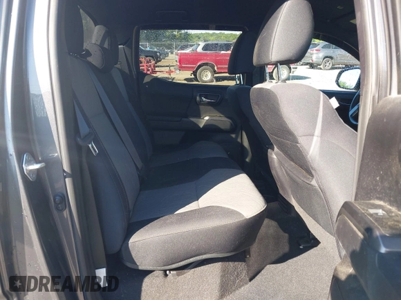 2021 Toyota Tacoma SR z VIN 3TYCZ5AN7MT017377, wystawiony jako IAAI lot #42285326 z przebiegiem 91 657 mil mil oraz . Historia ofert i sprzedaży dostępna na DreamBid. Obrazek 8.