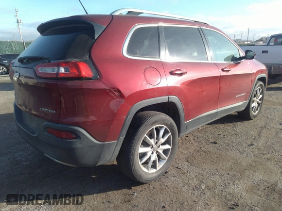 2014 Jeep Cherokee Limited with VIN 1C4PJMDB7EW165272, listed as a IAAI auction lot 35106260 with 102,934 mi miles and . Bid and sale history available at DreamBid. Image 4.