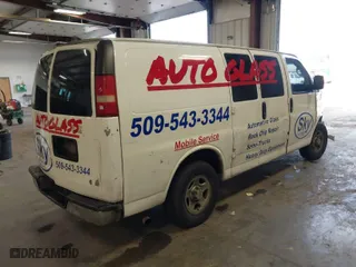 2007 Chevrolet Express Cargo Van with VIN 1GCFG15X571105039, listed as a IAAI auction lot 41763534 with 134,696 mi miles. Bid and sale history available at carsss.com. Image 4.