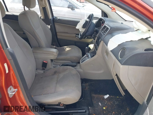 2010 Dodge Caliber Mainstreet z VIN 1B3CB3HA8AD598176, wystawiony jako IAAI lot #42090945 z przebiegiem 85 172 mil mil oraz . Historia ofert i sprzedaży dostępna na DreamBid. Obrazek 5.