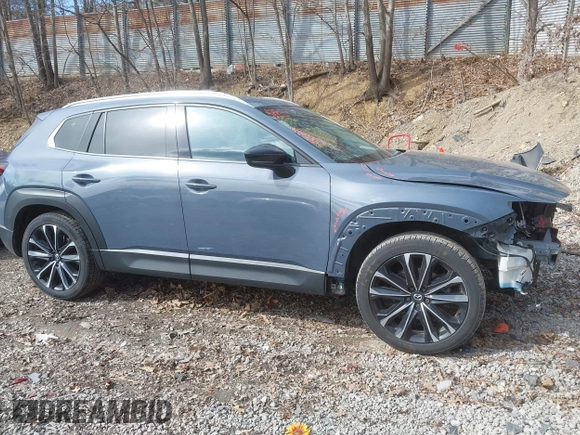 2023 Mazda CX-50 2.5 Turbo Premium Plus Package with VIN 7MMVABEY1PN101123, listed as a IAAI auction lot 41858602 with 34,541 mi miles. Bid and sale history available at carsss.com. Image 14.