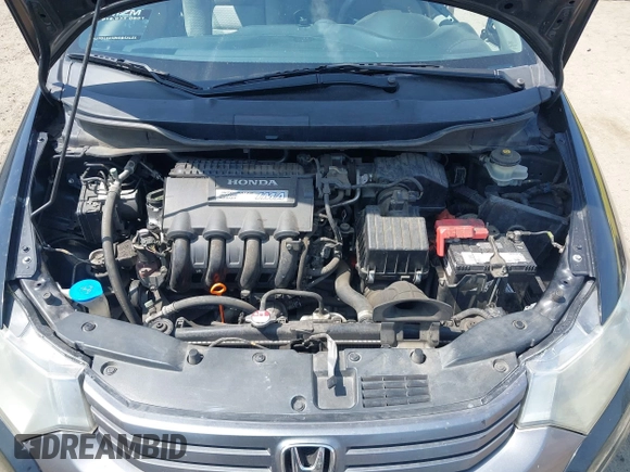 2010 Honda Insight LX with VIN JHMZE2H50AS014165, listed as a IAAI auction lot 42381535 with 169,032 mi miles and . Bid and sale history available at DreamBid. Image 10.