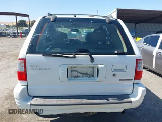 2001 Isuzu Rodeo S with VIN 4S2CK58W614332181, listed as a IAAI auction lot 42585130 with 196,497 mi miles and . Bid and sale history available at DreamBid. Image 16.