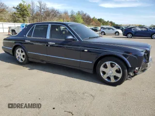2005 Bentley Arnage R z VIN SCBLC37F15CX10517, wystawiony jako Copart lot #54303364 z przebiegiem 116 865 mil mil oraz Szkody całkowita. Historia ofert i sprzedaży dostępna na DreamBid. Obrazek 4.