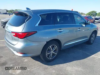 2016 Infiniti QX60 with VIN 5N1AL0MN8GC501966, listed as a IAAI auction lot 41789987 with 147,358 mi miles and . Bid and sale history available at DreamBid. Image 4.