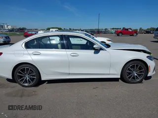 2021 BMW 3 Series 330i xDrive with VIN WBA5R7C0XMFK54525, listed as a IAAI auction lot 42320181 with 54,576 mi miles and . Bid and sale history available at DreamBid. Image 13.