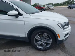 2020 Volkswagen Tiguan SE z VIN 3VV3B7AX4LM032609, wystawiony jako IAAI lot #42074359 z przebiegiem 52 404 mil mil oraz . Historia ofert i sprzedaży dostępna na DreamBid. Obrazek 18.