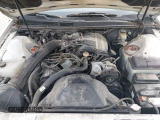 1990 Ford Thunderbird z VIN 1FAPP604XLH213209, wystawiony jako IAAI lot #42367380 z przebiegiem 33 382 mil mil oraz . Historia ofert i sprzedaży dostępna na DreamBid. Obrazek 10.