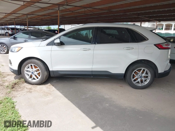 2021 Ford Edge SEL z VIN 2FMPK3J98MBA32220, wystawiony jako IAAI lot #41945825 z przebiegiem Nie podano mil oraz . Historia ofert i sprzedaży dostępna na DreamBid. Obrazek 14.