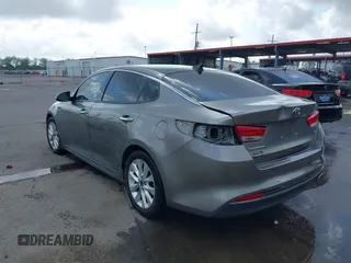 2018 Kia Optima EX with VIN 5XXGU4L36JG253629, listed as a IAAI auction lot 42079946 with 136,575 mi miles and . Bid and sale history available at carsss.com. Image 3.