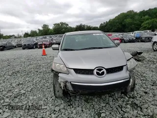 2010 Mazda CX-7 SV z VIN JM3ER2W53A0301123, wystawiony jako Copart lot #58711605 z przebiegiem 236 428 mil mil oraz Szkoda całkowita • Salvage title. Historia ofert i sprzedaży dostępna na DreamBid. Obrazek 13.