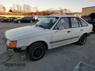 1988 Ford Escort z VIN 1FAPP959XJW370611, wystawiony jako Copart lot #86715994 z przebiegiem 3424 mil mil oraz Tytuł czysty. Historia ofert i sprzedaży dostępna na DreamBid. Obrazek 1.