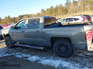 2017 Chevrolet Silverado 1500 LT with VIN 3GCUKREC2HG341135, listed as a IAAI auction lot 41464078 with 113,676 mi miles. Bid and sale history available at carsss.com. Image 14.