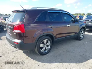 2012 Kia Sorento EX with VIN 5XYKU3A67CG224950, listed as a IAAI auction lot 41523784 with 113,930 mi miles. Bid and sale history available at carsss.com. Image 4.