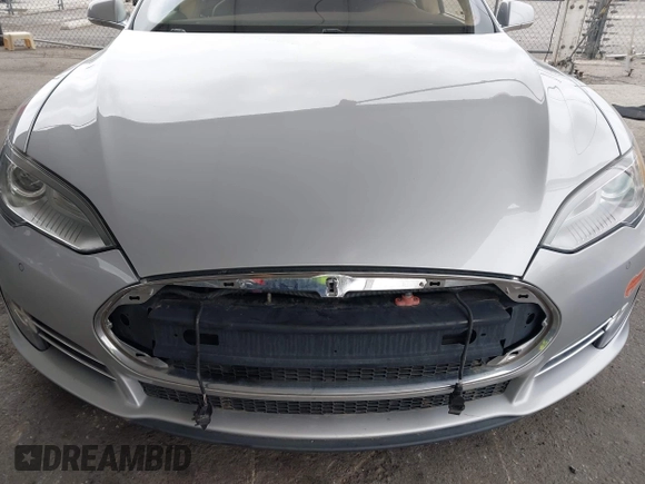 2014 Tesla Model S 60 with VIN 5YJSA1H12EFP32213, listed as a IAAI auction lot 42194085 with 56,071 mi miles and . Bid and sale history available at DreamBid. Image 6.