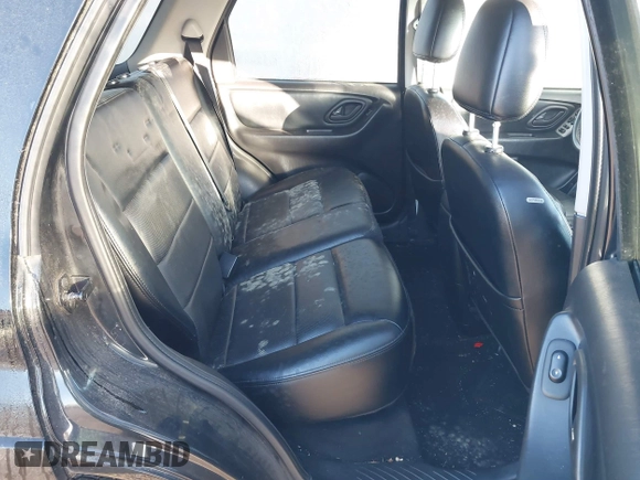2005 Ford Escape Limited with VIN 1FMCU94115KB85496, listed as a IAAI auction lot 41384428 with 158,852 mi miles and . Bid and sale history available at DreamBid. Image 8.
