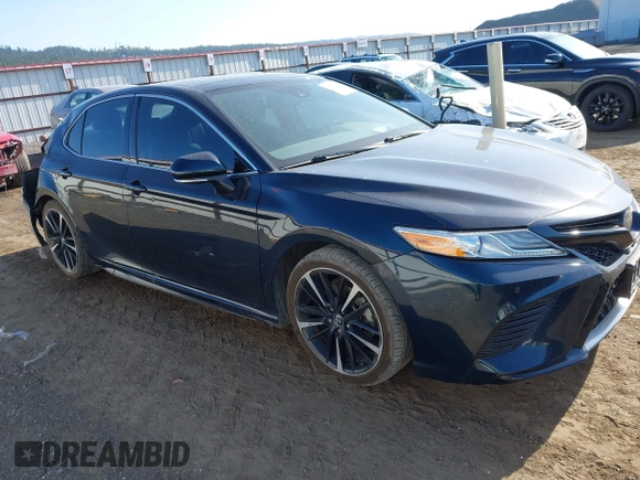 2020 Toyota Camry XSE with VIN 4T1K61AK0LU320375, listed as a IAAI auction lot 42126158 with 99,470 mi miles and . Bid and sale history available at DreamBid. Image 1.