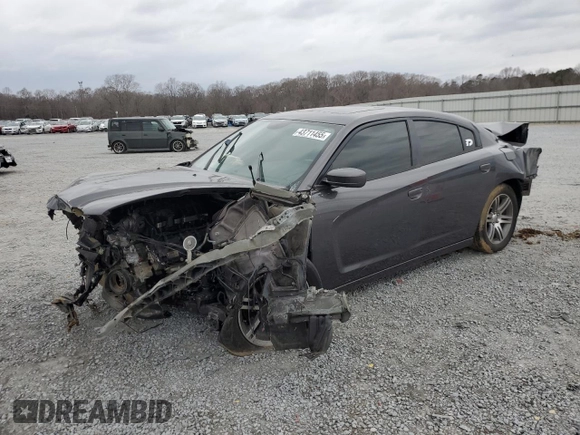 2013 Dodge Charger RT with VIN 2C3CDXCT8DH635148, listed as a Copart auction lot 43711455 with 179,701 mi miles and Salvage Title. Bid and sale history available at carsss.com. Image 1.