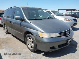 2001 Honda Odyssey EX z VIN 2HKRL18621H541553, wystawiony jako IAAI lot #42469447 z przebiegiem 241 701 mil mil oraz . Historia ofert i sprzedaży dostępna na DreamBid. Obrazek 1.