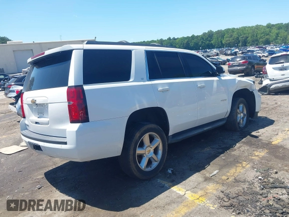2015 Chevrolet Tahoe LT with VIN 1GNSCBKC4FR648715, listed as a IAAI auction lot 42267719 with Not provided miles and . Bid and sale history available at DreamBid. Image 4.
