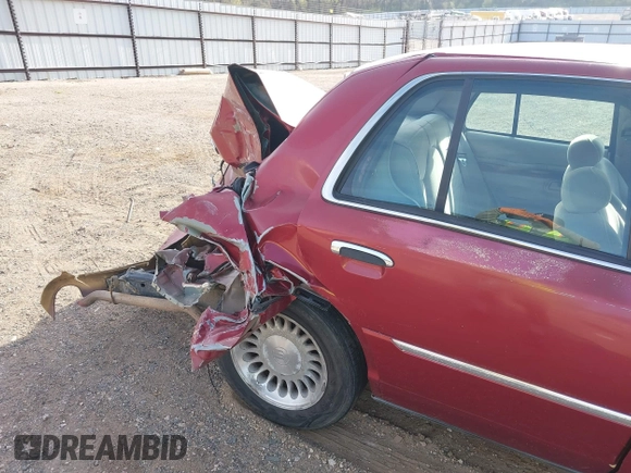 2000 Mercury Grand Marquis LS z VIN 2MEFM75W1YX736283, wystawiony jako IAAI lot #41879063 z przebiegiem 114 535 mil mil oraz . Historia ofert i sprzedaży dostępna na DreamBid. Obrazek 17.