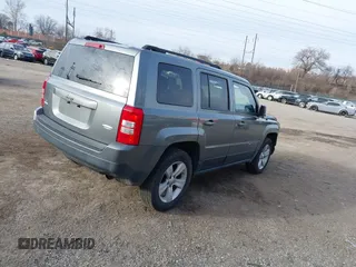 2012 Jeep Patriot Latitude with VIN 1C4NJRFB3CD599831, listed as a IAAI auction lot 41627914 with 135,534 mi miles and . Bid and sale history available at carsss.com. Image 4.