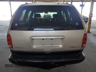 1998 Dodge Caravan LE with VIN 1B4GP54LXWB743058, listed as a Copart auction lot 80271164 with 192,048 mi miles and Salvage title. Bid and sale history available at DreamBid. Image 6.