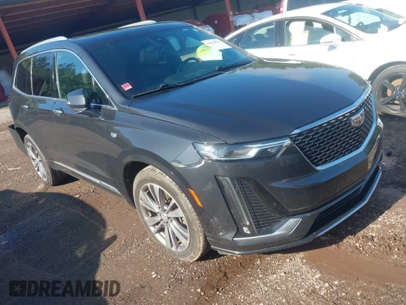 2020 Cadillac XT6 FWD Premium Luxury with VIN 1GYKPCRS0LZ206567, listed as a IAAI auction lot 42254511 with 80,443 mi miles and . Bid and sale history available at DreamBid. Image 1.