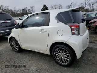 2012 Scion iQ with VIN JTNJJXB0XCJ011508, listed as a Copart auction lot 42368065 with 161,965 mi miles and Salvage title. Bid and sale history available at DreamBid. Image 2.