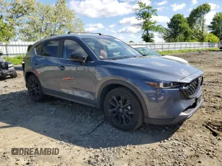2023 Mazda CX-5 S Carbon Edition z VIN JM3KFBCM9P0110080, wystawiony jako Copart lot #55911635 z przebiegiem 20 835 mil mil oraz Szkoda całkowita • Salvage title. Historia ofert i sprzedaży dostępna na DreamBid. Obrazek 4.
