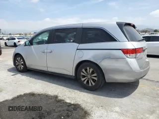 2014 Honda Odyssey EX-L with VIN 5FNRL5H64EB088080, listed as a Copart auction lot 56066845 with 238,512 mi miles and Clean Title. Bid and sale history available at DreamBid. Image 2.