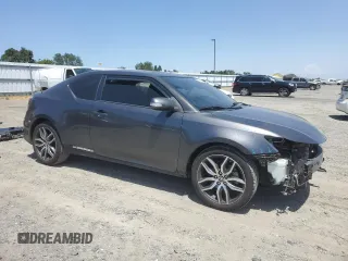 2015 Scion tC z VIN JTKJF5C76FJ010813, wystawiony jako Copart lot #58987575 z przebiegiem 108 709 mil mil oraz Szkoda całkowita • Salvage title. Historia ofert i sprzedaży dostępna na DreamBid. Obrazek 4.