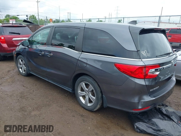2018 Honda Odyssey EX-L z VIN 5FNRL6H74JB043276, wystawiony jako IAAI lot #42326742 z przebiegiem 126 025 mil mil oraz . Historia ofert i sprzedaży dostępna na DreamBid. Obrazek 3.