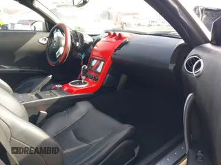 2005 Nissan 350Z Touring z VIN JN1AZ36A05M755776, wystawiony jako IAAI lot #41509506 z przebiegiem 79 148 mil mil oraz . Historia ofert i sprzedaży dostępna na DreamBid. Obrazek 5.