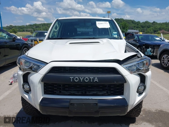 2018 Toyota 4Runner SR5 with VIN JTEBU5JRXJ5595186, listed as a IAAI auction lot 42607713 with 83,592 mi miles and . Bid and sale history available at DreamBid. Image 13.