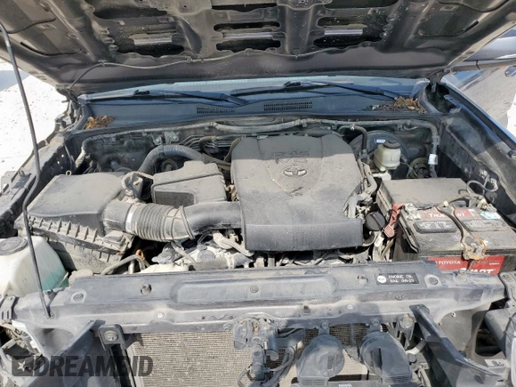2017 Toyota Tacoma SR5 z VIN 5TFRZ5CNXHX025315, wystawiony jako Copart lot #57901395 z przebiegiem 158 197 mil mil oraz Szkoda całkowita • Salvage title. Historia ofert i sprzedaży dostępna na DreamBid. Obrazek 11.